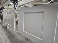 Custom cabinet doors professionally finished with a smooth, durable white coating. Custom cabinet doors finished with a smooth white painted coating by Leone’s Custom Coatings.