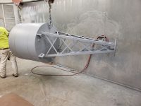 Heavy industrial component finished with a high-performance protective coating by Leone’s Custom Coatings. Industrial steel component coated with a durable protective finish by Leone’s Custom Coatings in Traverse City, Michigan.