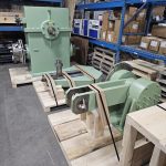 Industrial machinery components coated and prepared for delivery by Leone’s Custom Coatings. Large industrial machinery components finished with custom protective coatings and staged for transport at Leone’s Custom Coatings in Traverse City, Michigan.