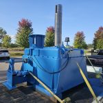 Large industrial equipment coated for long-term durability by Leone’s Custom Coatings. Large industrial machine finished with a durable blue protective coating by Leone’s Custom Coatings in Traverse City, Michigan.
